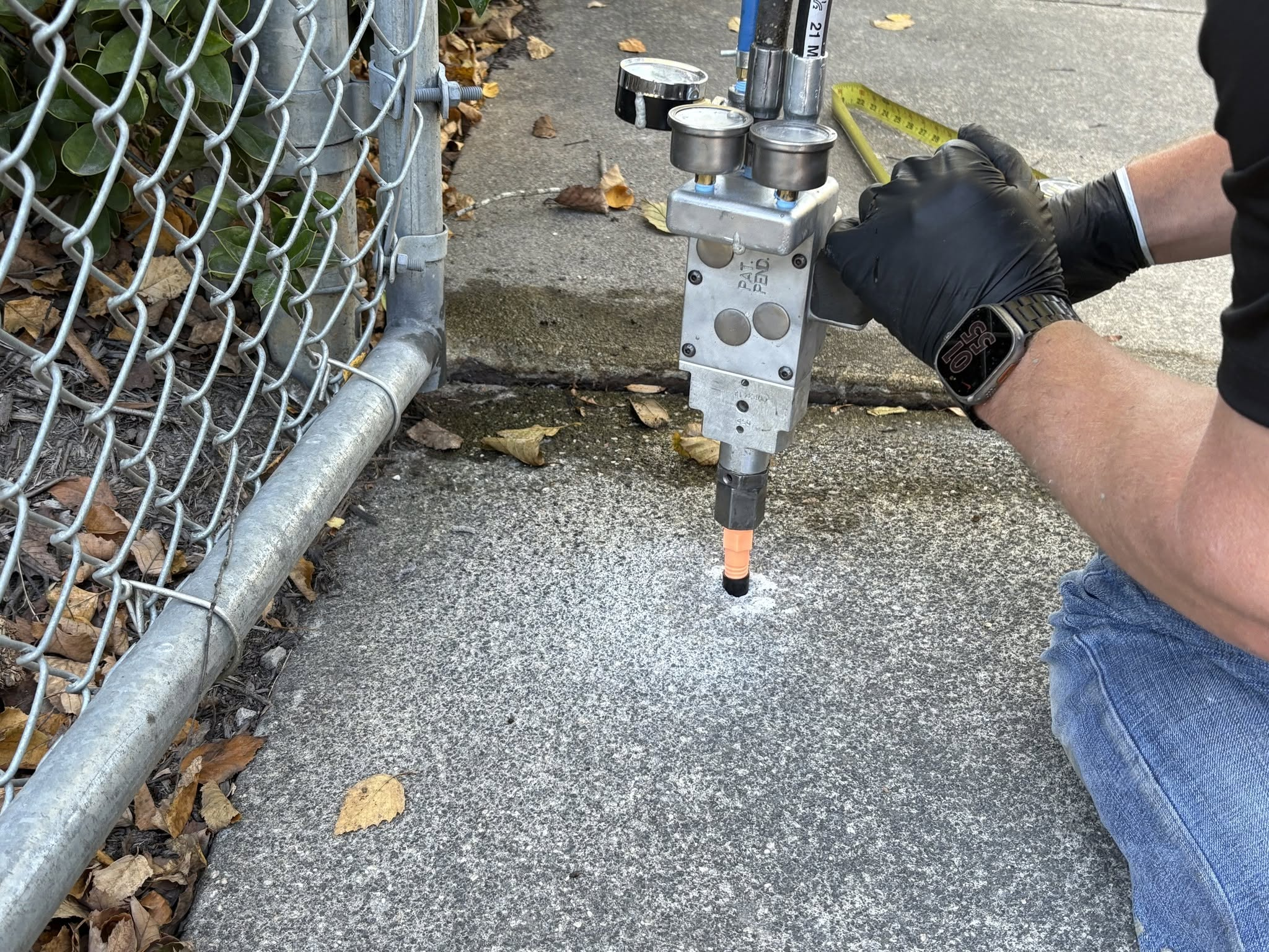 Close-up of foam injection gun at port